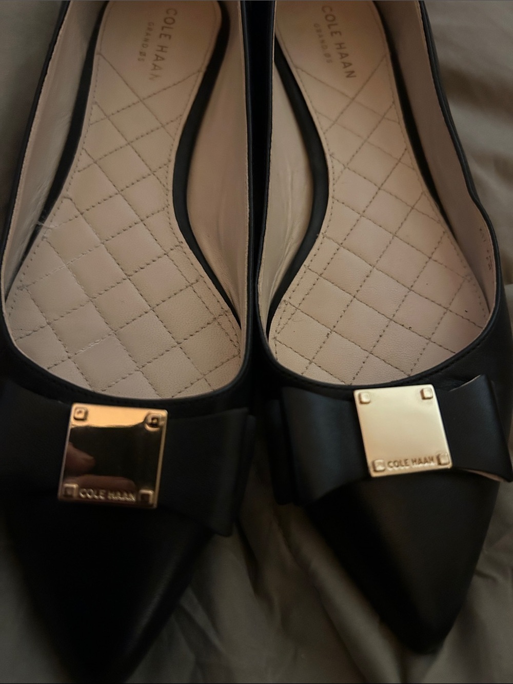 Cole Haan Black Pointed Toe Bow Flats with Gold Plaque NWOT - Picture 2 of 5